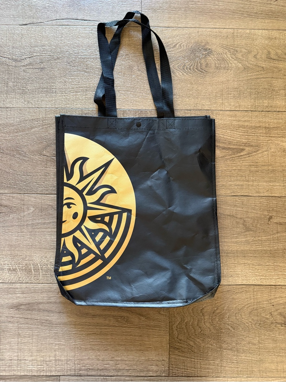 Cirque du Soleil Sol Black and Yellow Sun Graphic Tote Bag